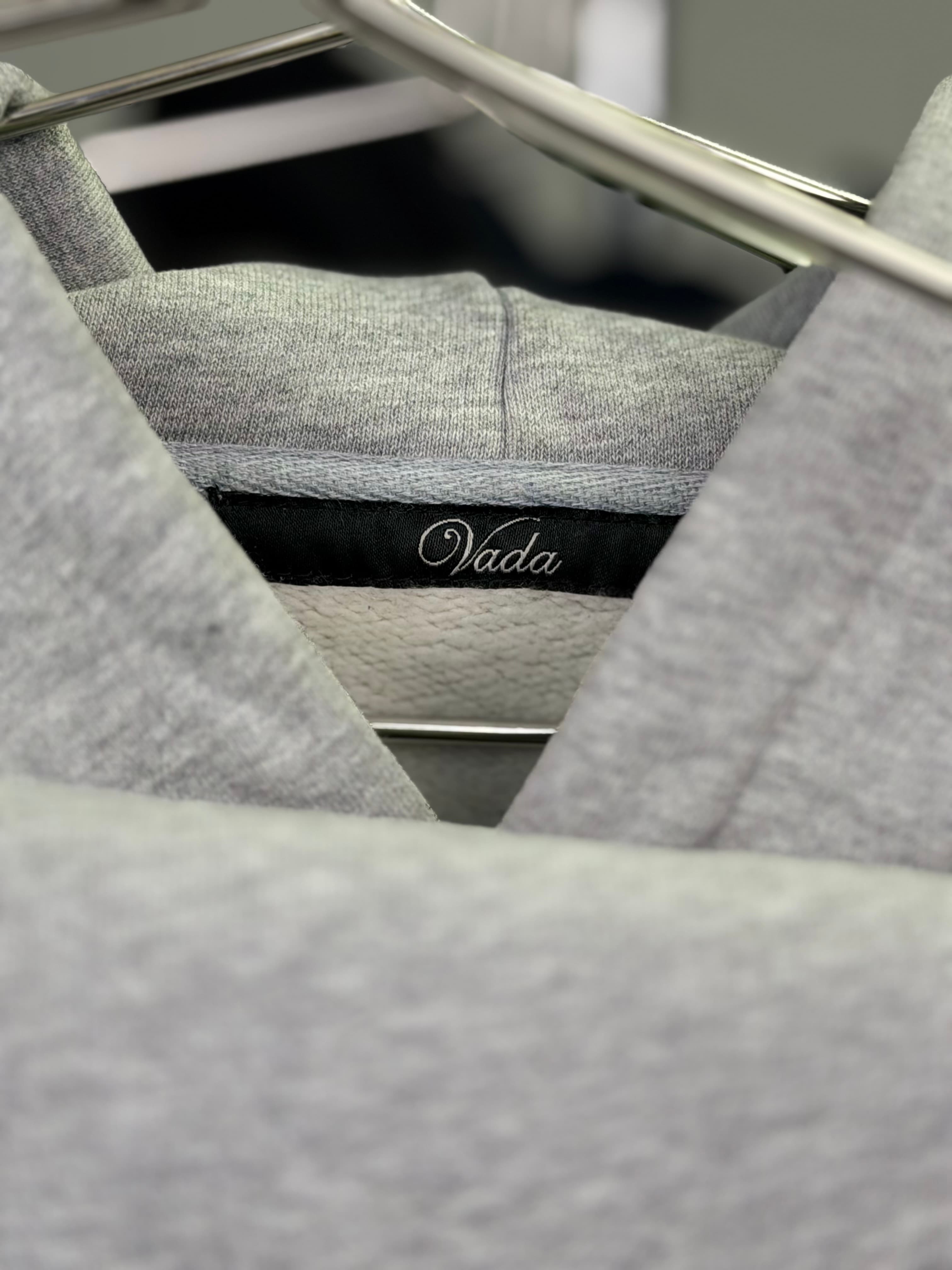 VadaWear hoodies in multiple colors hanging on a rack