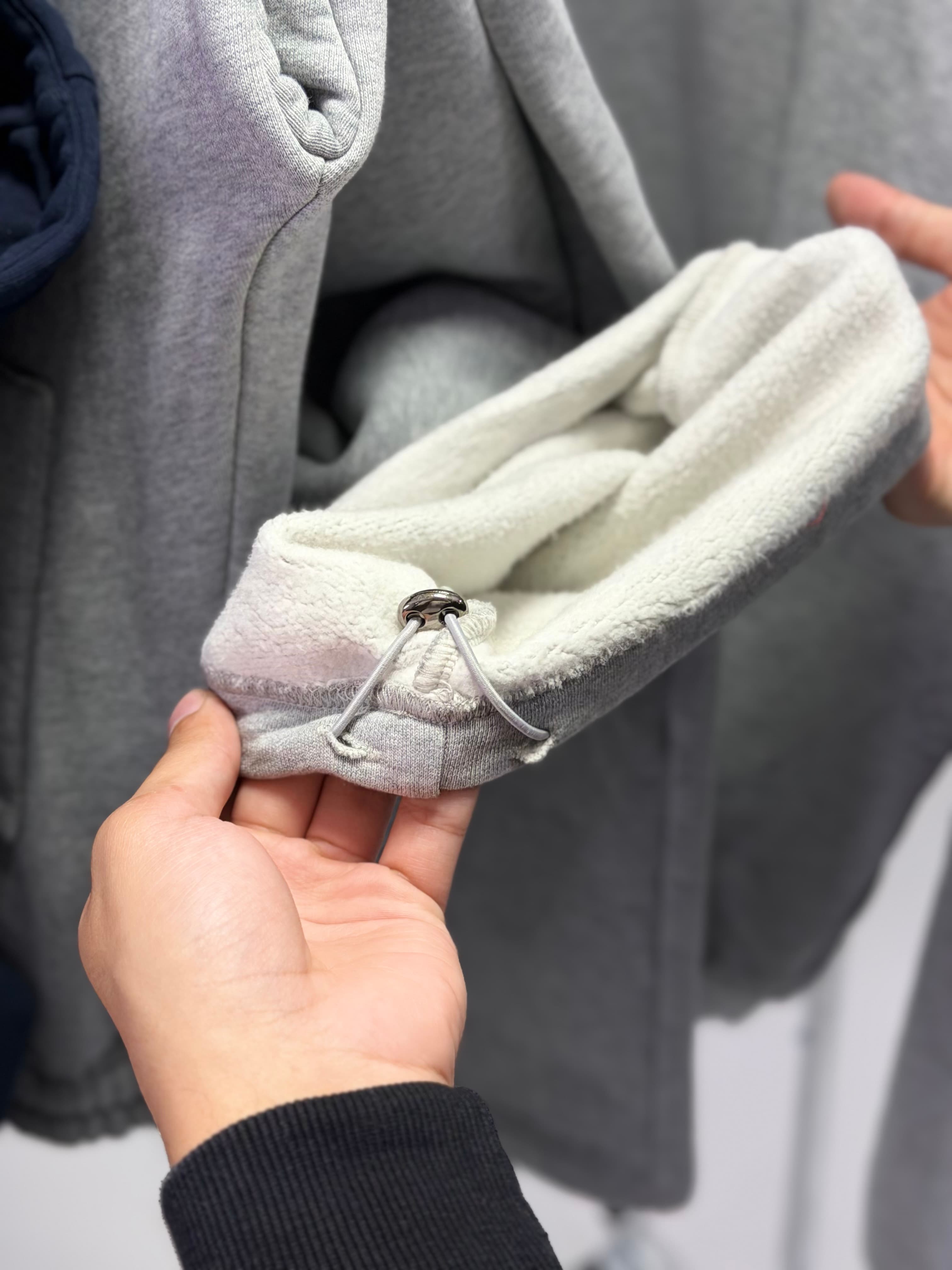 Close-up of a VadaWear hoodie drawstring and hood lining